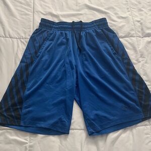 Nike Dri Fit boys blue shorts with 2 front side pockets size medium